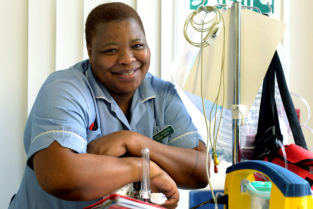 Nurse with cluttered background